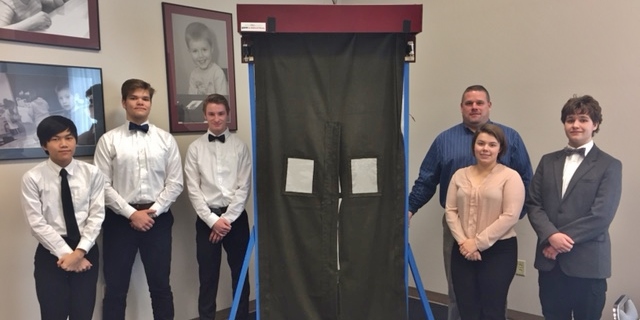 Members of the PMHS STEM team, from left, Kevin Ward, Ryan Mahoney, Cole Yecker, Calle MacDonald, Joshua Adams and teacher Barry Groff pose with the fire barrier prototype.