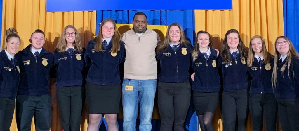 Keystone Award winners with high school principal Baron Jones.