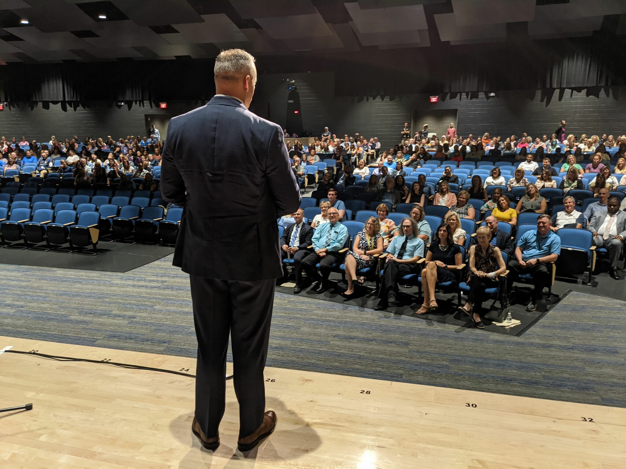 Photo of Dr. Phil Gale addressing the audience in Penn Manor High School auditorium