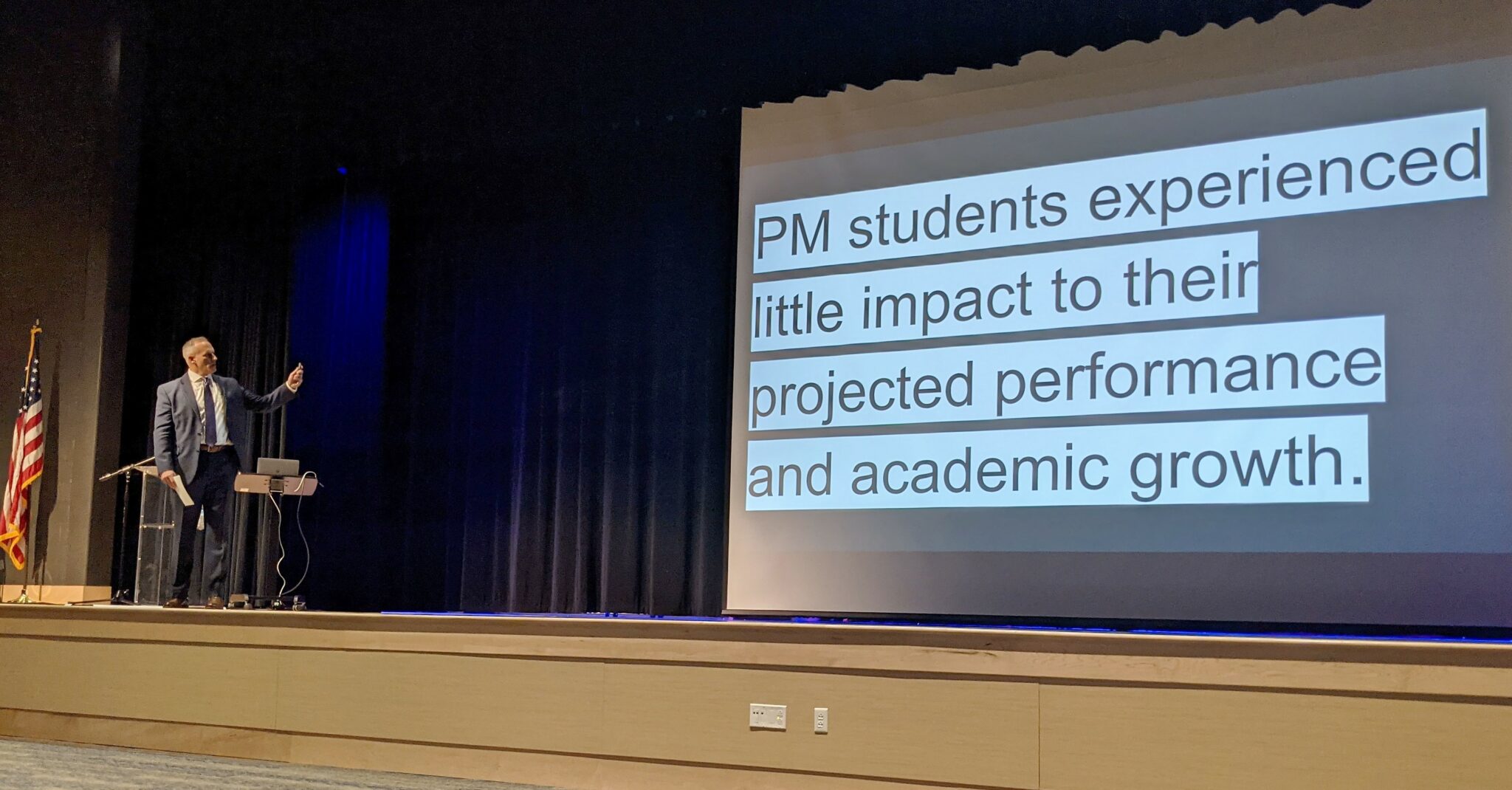 Photo of Dr. Phil Gale addressing the audience in Penn Manor High School auditorium